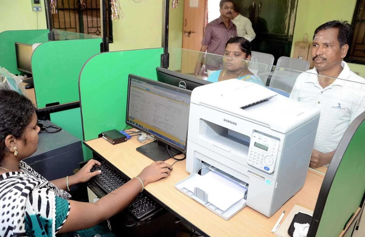Operator assisting a customer at the service counter